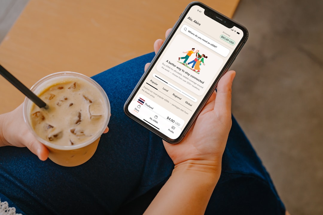 Digital nomad staying connected with an eSIM on their iPhone device